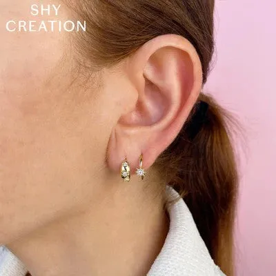 0.10CT DIAMOND STARBURST HUGGIE EARRING