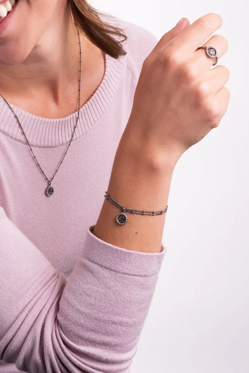 Black Rhodium Layers of Perseverance Bracelet? in White Zircon
