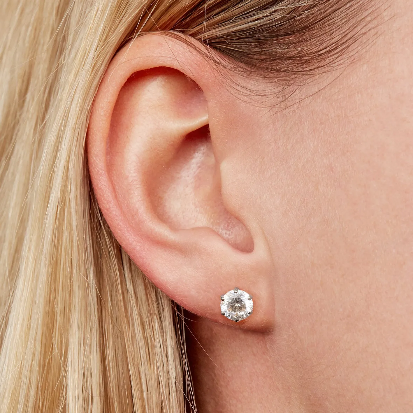 Round Brilliant stud earrings with 2 carats* of diamond simulants in 10 carat white gold