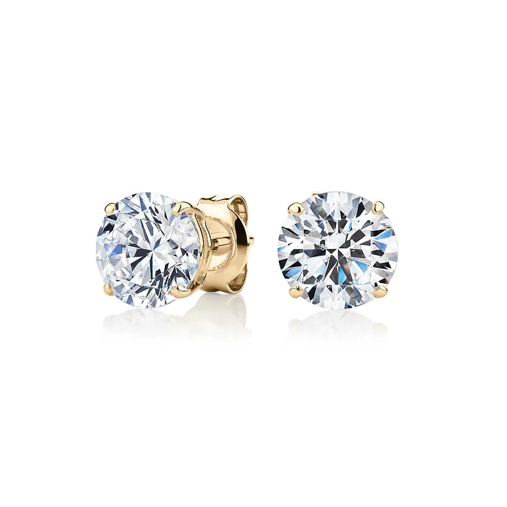 Round Brilliant stud earrings with 3 carats* of diamond simulants in 10 carat yellow gold