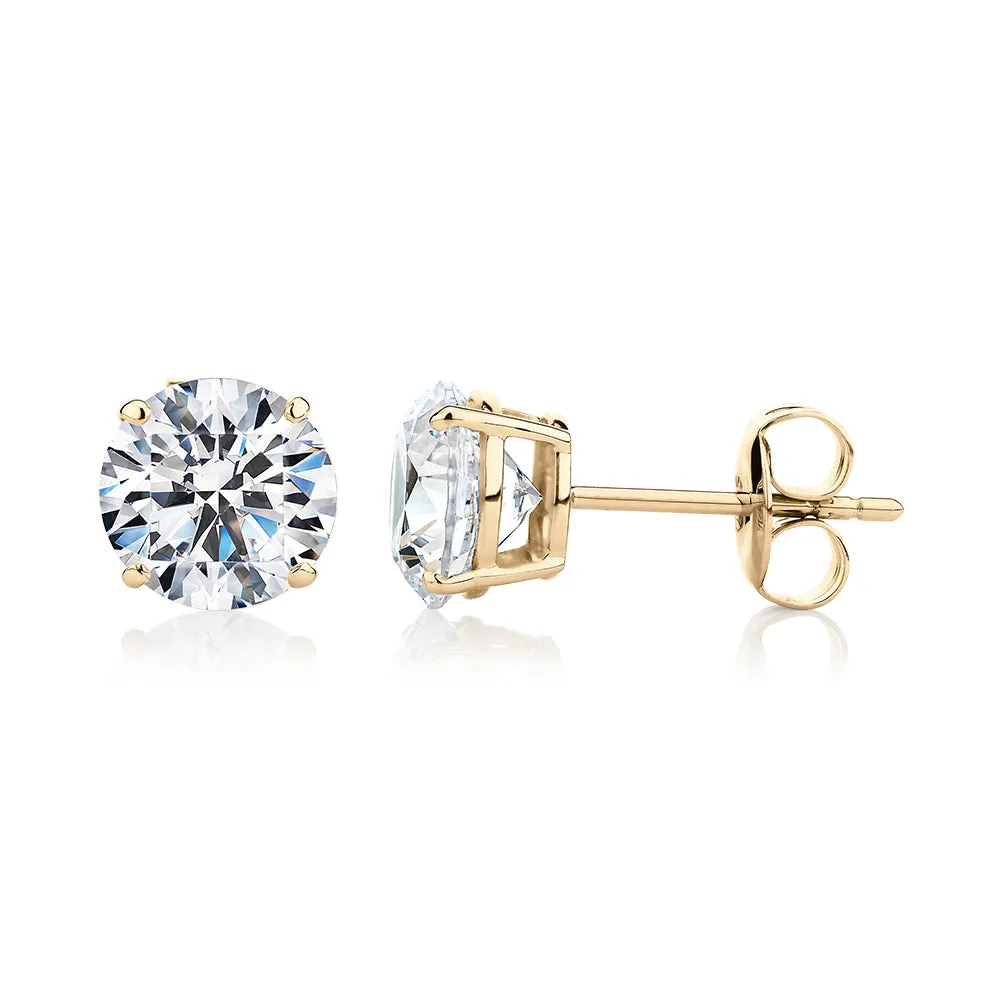Round Brilliant stud earrings with 3 carats* of diamond simulants in 10 carat yellow gold