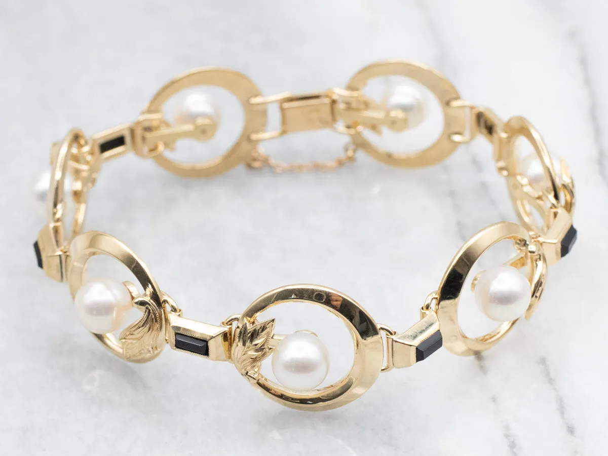 White Pearl and Black Onyx Gold Botanical Link Bracelet